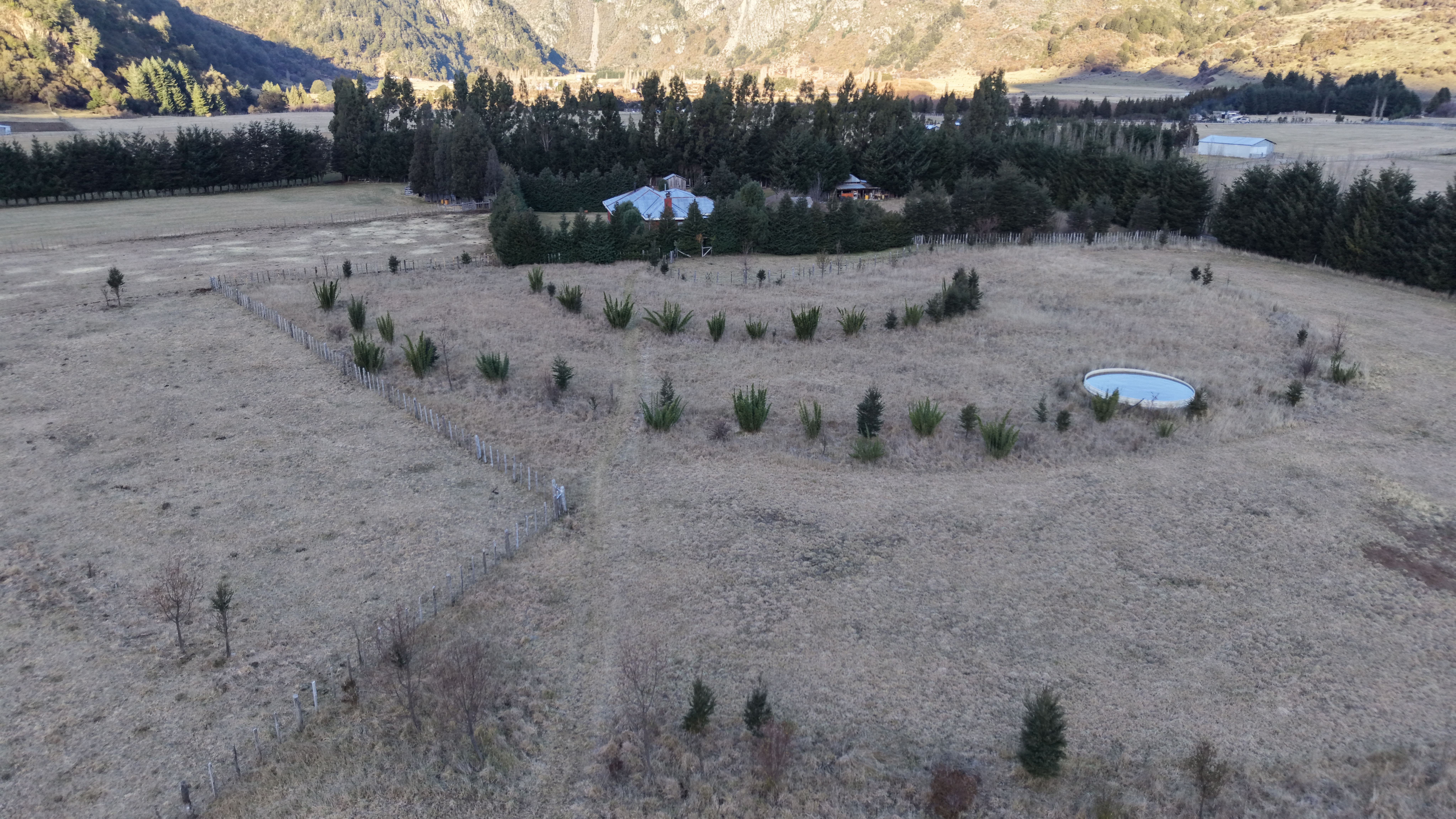 Aerial view of the main house at Fundo La Pampita at sunset, August 2026